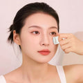 08 / MINIMALIST WHITE SILICONE FACIAL ROLLER
